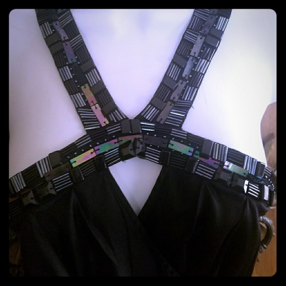 BEBE Beautiful black blouse with nice details .